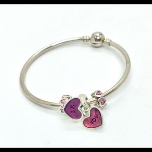 Official Pandora Bangle Bracelet with 3 charms.
